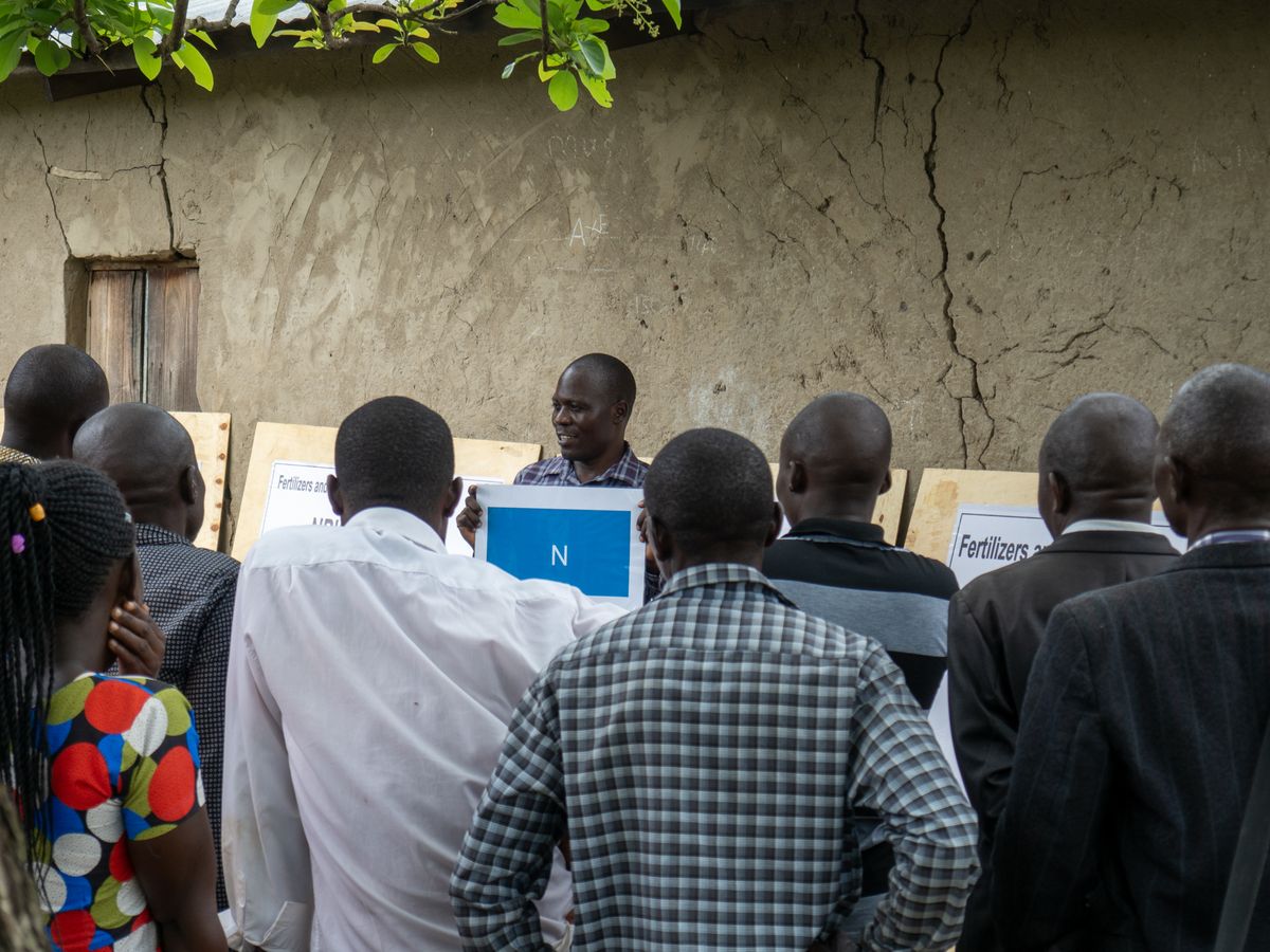 Extension officer presenting to farmers